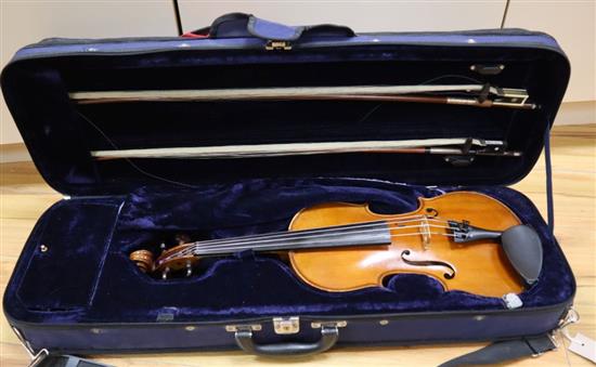 A violin and two bows in a case by Adolf Durenzy French